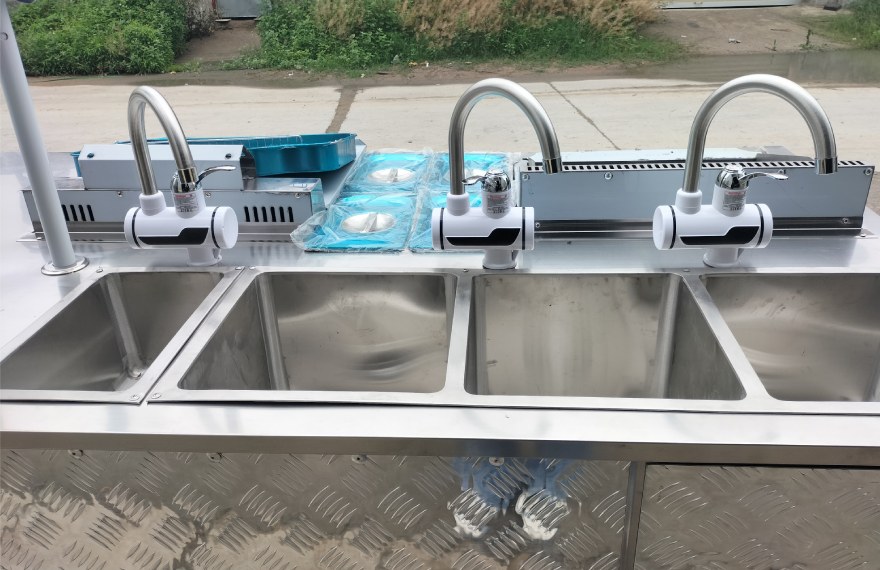 3 compartment water sink and a hand sink